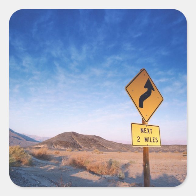 Sign on the death valley road in sunset square sticker (Front)
