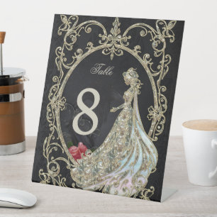 Signe De Table Élégance en or et noir.