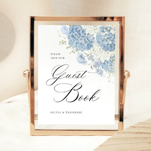 Signe De Table Livre d'or de mariage sur table en bleu poussiéreu