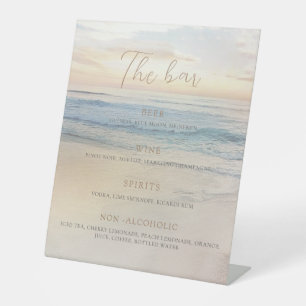 Signe De Table Mariage minimaliste sur la plage au coucher du sol