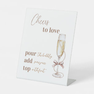 Signe De Table Pearls et Prosecco encouragent à aimer la Fête des