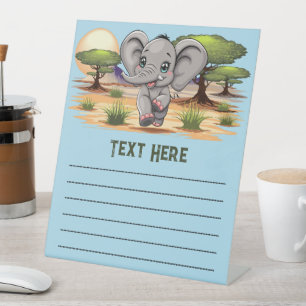 Signe De Table Un bébé éléphant qui sonne heureux dans la savane 