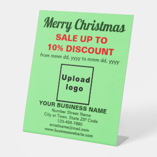 Signe De Table Vente de Noël d'affaires sur le vert clair
