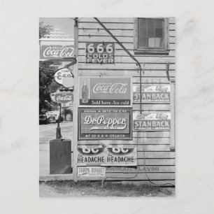 Signs on a General Store, 1938 Postcard