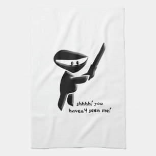 Silent black ninja assassin, armed and dangerous kitchen towel