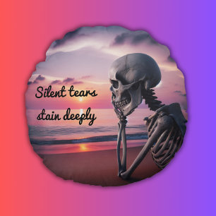 Silent tears stain deeply round pillow