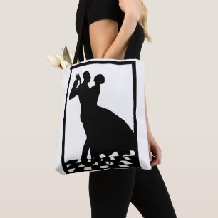 silhouette couple dancing in the dark tote bag