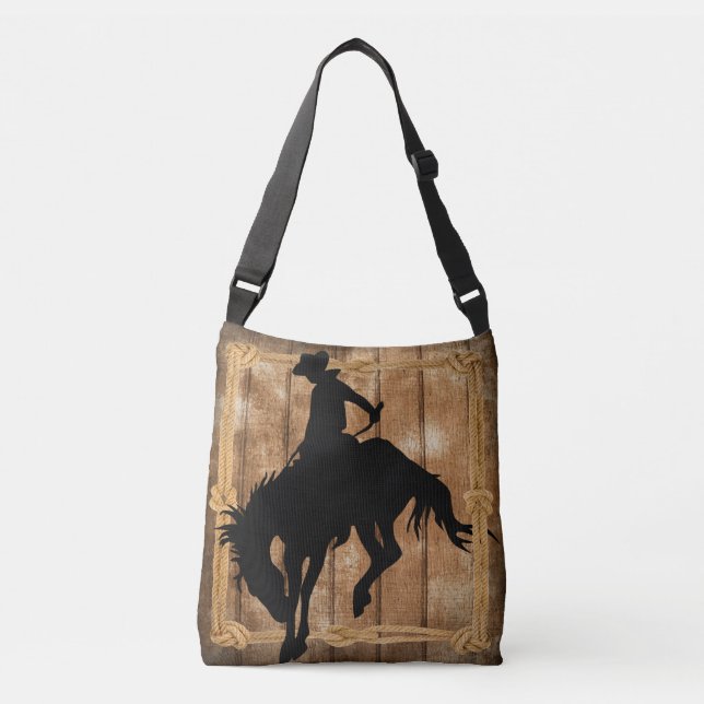 Silhouette Cowboy on a Bucking Bronco Horse Crossbody Bag (Front)