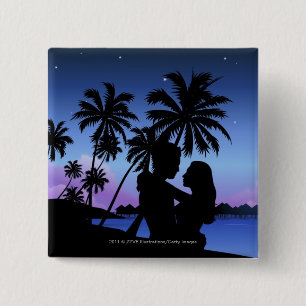 Silhouette of a couple embracing on the beach 2 inch square button