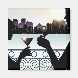 Silhouette of a couple toasting martini glasses magnet