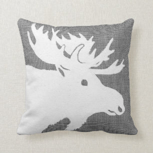Silhouette of a white moose on a soft grey bckgrnd throw pillow