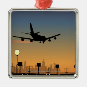 Silhouette of an airplane in flight metal ornament