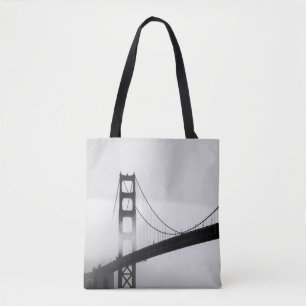 SILHOUETTE OF BRIDGE COVERED BY MIST TOTE BAG