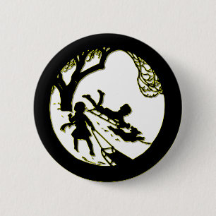 Silhouette of children sledding with their dog 2 inch round button