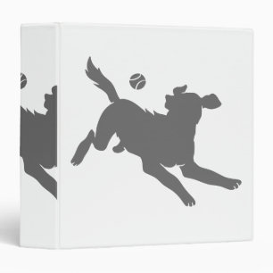 Silhouette of dog with ball binder