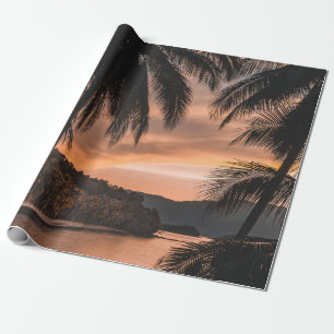 Silhouette of palm tree during golden hour wrapping paper