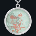 Silhouette of Red Flowers on Teal Background Silver Plated Necklace<br><div class="desc">Three red flowers contrast against a teal background in this painting by Megan Meagher. A silhouette of another flower leans in from the left of the print. A simple piece with a lot going on. This would make nice gift for a friend or loved out who enjoys art!</div>