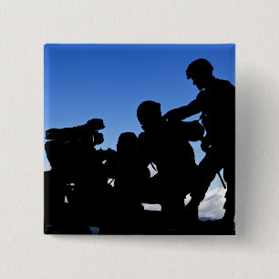 Silhouette of soldiers 2 inch square button