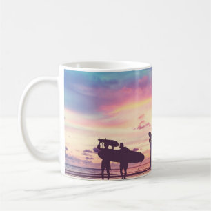 Silhouette Of surfer people carrying their surfboa Coffee Mug