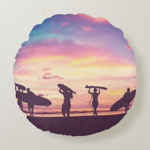 Silhouette Of surfer people carrying their surfboa Round Pillow