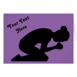 Silhouette of Woman Kneeling in Prayer