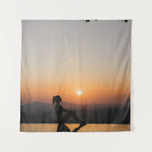Silhouette of woman sitting on edge of eternity po tapestry