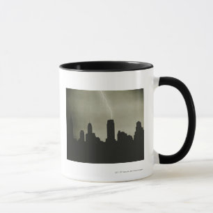 Silhouettes of skyscrapers and lightning in sky mug