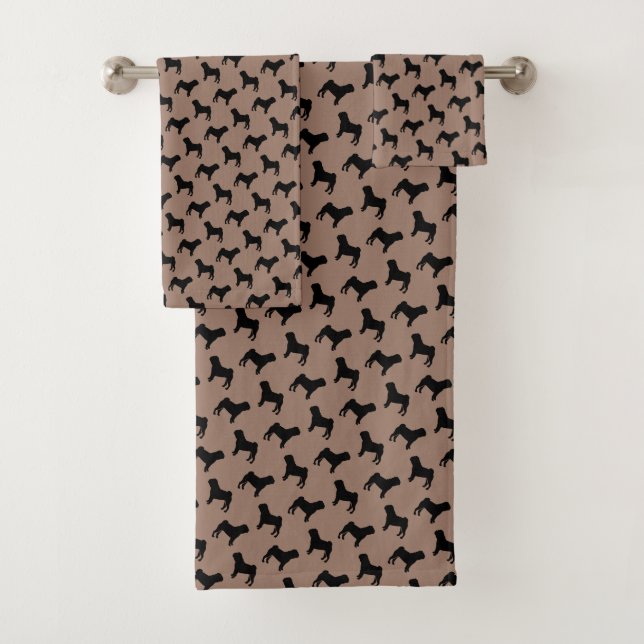 Silhouttes de chien de Carlin noir sur le beige ka (En situation)