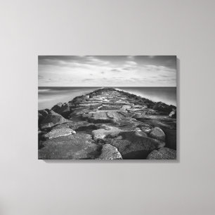Silky Ocean Against the Jetty Canvas Print