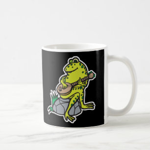 silly frog playing guitar coffee mug