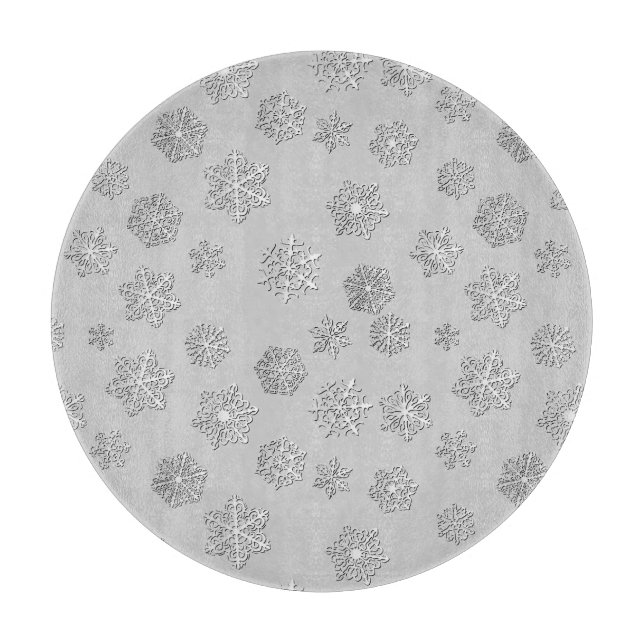 Silver 3-d snowflakes on a silver background cutting board (Front)