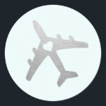 Silver Airplane with Heart Romantic Travel Theme Classic Round Sticker<br><div class="desc">Our exclusive faux foil silver airplane with a heart centre sticker makes a perfect travel theme favour label or destination wedding, birthday, anniversary or baby or bridal shower invitation envelope seal. • • • Click CUSTOMIZE FURTHER to change background colour or add text. • • • Also available in gold, rose gold, and copper,...</div>