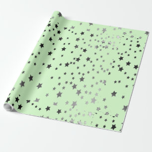 Silver and black stars on green wrapping paper