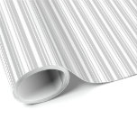 Silver and White Stripes Wrapping Paper<br><div class="desc">Silver and White Stripes - Thick and thin alternating stripes in burnished matte Christmas silver set off against bright white make an eye-catching and pleasing repeat pattern. Elegant and classic, use Silver and White Stripes with Christmas colours of Red and Green to mark the festive season.</div>