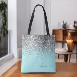 Silver Aqua Teal Blue Girly Glitter Monogram Tote Bag<br><div class="desc">Teal Aqua Blue and Silver Faux Sparkle and Glitter Elegant Monogram Book Bag. This Book Bag can be customized to include your initial and first name and given as a gift for Christmas,  Sweet 16 Birthday,  Bridal Shower or a Wedding.</div>