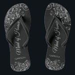 Silver & Black Elegant Maid of Honour Wedding Flip Flops<br><div class="desc">These beautiful wedding flip flops are a great way to thank and recognize your Maid of Honour while saving her feet at the same time. Features an elegant design with ornate silver grey curls and swirls on a black background and fancy script lettering. The test reads Maid of Honour with...</div>