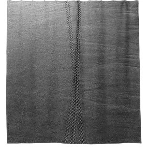 Silver chain link on grey textile