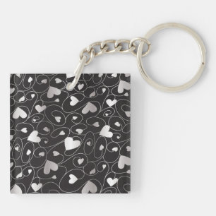 Silver curly hearts keychain