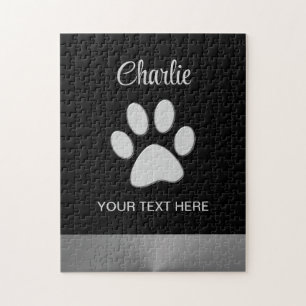 Silver Dog Paw on black background Jigsaw Puzzle