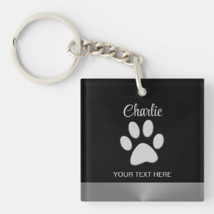 Silver Dog Paw on black background Keychain