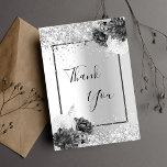 Silver floral glitter elegant glamourous thank you card<br><div class="desc">Faux silver looking background,  decorated with faux glitter,  sparkles and florals.On front large hand lettered script and the text: Thank You.
Back: Personalize and add your thank you note and name.</div>