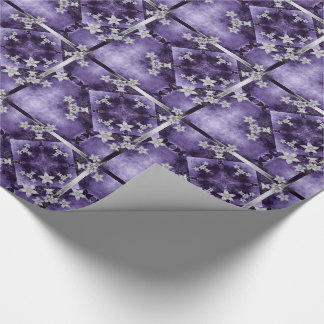 Silver flowers on purple and black wrapping paper