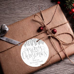 Silver Foil Effect Typography Merry Christmas Classic Round Sticker<br><div class="desc">Send out this year's holiday greetings in style with these unique and modern holiday stickers. The design features a festive silver foil effect typography script "Merry Christmas" with matching hanging foliage on a clean white background. These stickers can be used as envelope seals, Christmas gift tags, holiday party favour stickers,...</div>