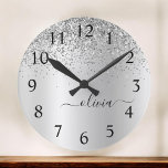 Silver Glitter Glam Metal Monogram Name Round Clock<br><div class="desc">Silver Faux Foil Metallic Sparkle Glitter Brushed Metal Monogram Name Clock. This makes the perfect sweet 16 birthday,  wedding,  bridal shower,  anniversary,  baby shower or bachelorette party gift for someone that loves glam luxury and chic styles.</div>