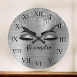 Silver Glitter Sparkle Eyelashes Monogram Name Round Clock<br><div class="desc">Silver Faux Foil Metallic Sparkle Glitter Brushed Metal Monogram Name and Initial Eyelashes (Lashes),  Eyelash Extensions and Eyes small decorative clock. The design makes the perfect sweet 16 birthday,  wedding,  bridal shower,  anniversary,  baby shower or bachelorette party gift for someone looking for a trendy cool style.</div>