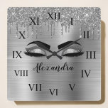 Silver Glitter Sparkle Eyelashes Monogram Name Square Wall Clock<br><div class="desc">Silver Faux Foil Metallic Sparkle Glitter Brushed Metal Monogram Name and Initial Eyelashes (Lashes),  Eyelash Extensions and Eyes cute wall clock. The design makes the perfect sweet 16 birthday,  wedding,  bridal shower,  anniversary,  baby shower or bachelorette party gift for someone looking for a trendy cool style.</div>