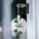 Silver green florals elegant name keychain<br><div class="desc">A faux silver looking background decorated with green florals,  flowers. Personalize and add your monogram initials and first name</div>