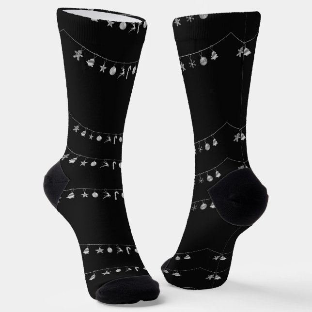 Silver hanging Xmas ornaments on black Socks (Angled)