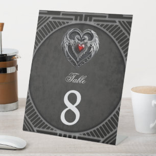 Silver heart with wings. pedestal sign