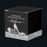 Silver High Heels Glitter Glam Birthday Party Favor Box<br><div class="desc">Elegant personalized square party favour box with silver glitter high heel stiletto shoes and a silver faux glitter border with confetti sprinkles on a black background with custom thank you text, perfect for a modern and chic birthday, bat mitzvah, Quinceañera, bridal shower, baby shower or bachelorette party. USE THE DESIGN...</div>